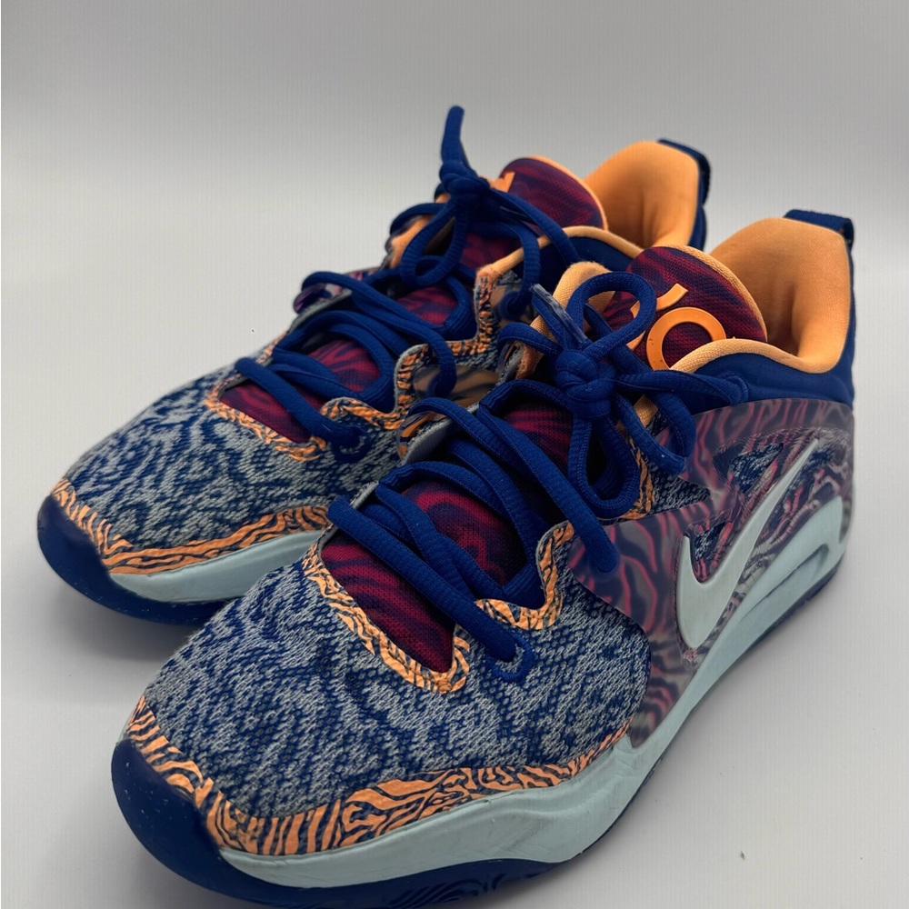 Nike women’s “nepheesa collier” Blue and Orange Athletic Shoes
